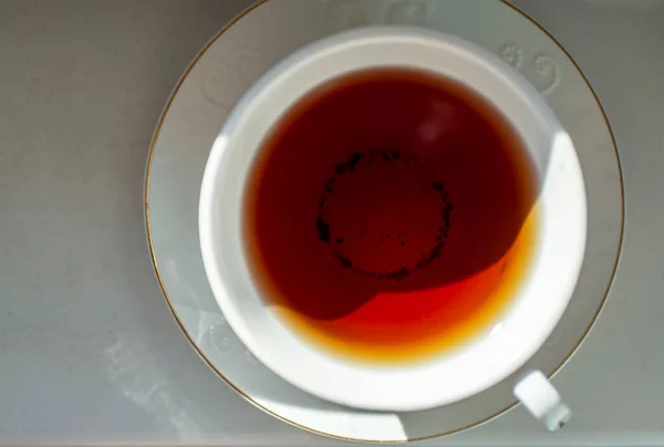 Mug Fresh Hot Tea Windowsill Illuminated Sun Top View — Stock Photo, Image