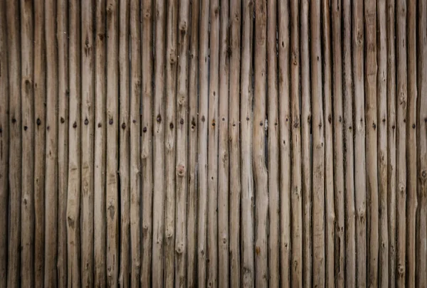 Texture of dry wood sticks knocked down with metal nails