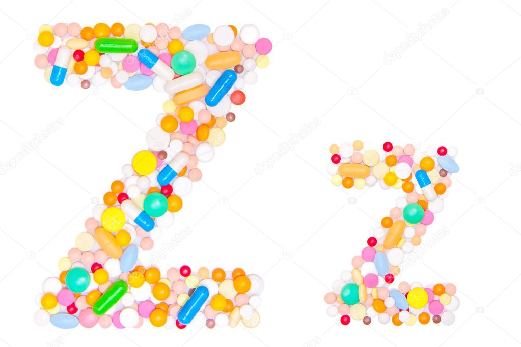 Letter Z, English alphabet, made, collected from medical tablets, pills, capsules, vitamin. Isolated on white background. Concept: ABC, design, logo, title, text, word