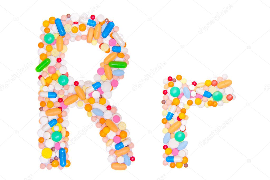 Letter R, English alphabet, made, collected from medical tablets, pills, capsules, vitamin. Isolated on white background. Concept: ABC, design, logo, title, text, word