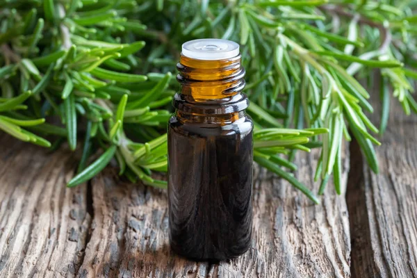 Bottle Essential Oil Fresh Rosemary Twigs — Stock Photo, Image