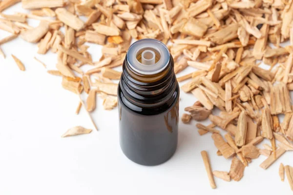 Bottle Essential Oil Cedar Wood Chips — Stock Photo, Image