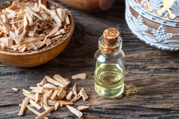 Bottle Essential Oil Cedar Wood Chips — Stock Photo, Image