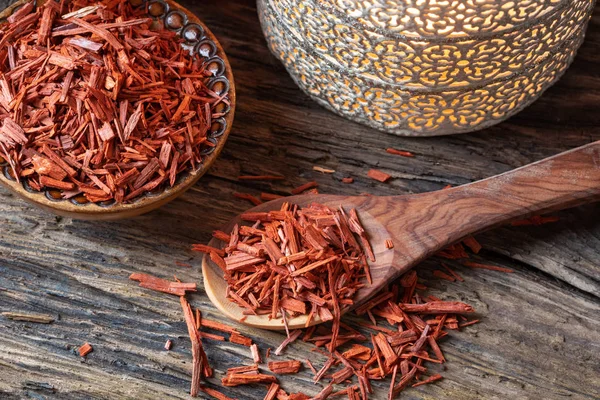 Red sandalwood on a spoon — Stock Photo, Image