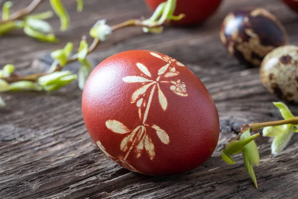 Easter egg dyed with onion peels and quail eggs