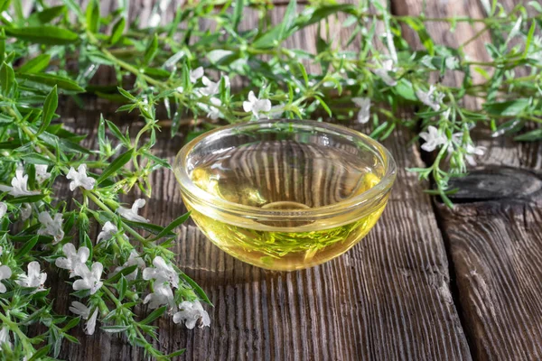 A bowl of mountain savory essential oil