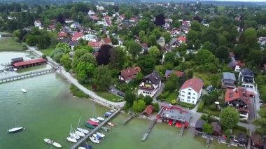 Ammersee Bavaria Germany 15 June 2025 aerial view with sailboats pier and village houses Editorial use only