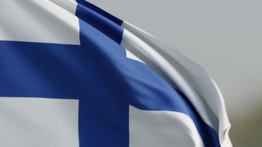 Finlandiya ulusal bayrağı beyaz arka planda belirgin mavi İskandinav haçını göstererek ülkenin kimliğini sembolize eder.