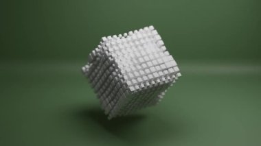 Dinamik animasyon, çok daha küçük, dalgalanan küplerden oluşan büyük bir beyaz küpü, pürüzsüz yeşil bir arkaplana karşı oluşturur. Bu geometrik yapı titreşir ve büyüleyici bir dijital sanat efekti yaratır.