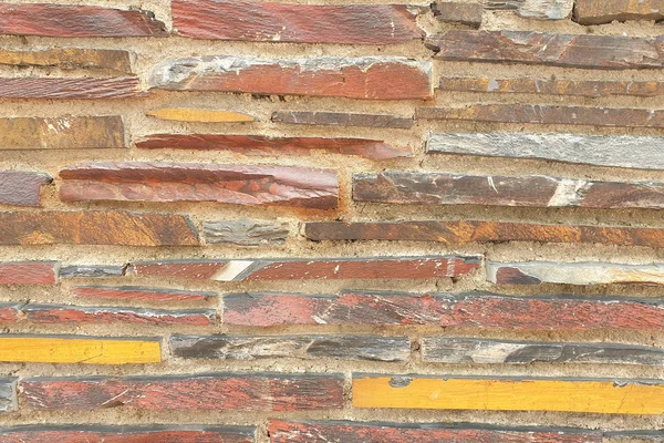 Una pared de piedra de piedra en bruto. Textura de piedra. Pared de piedra . — Foto de Stock