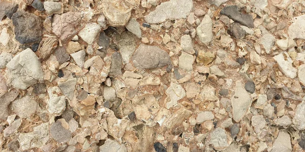 Piedra. Textura de piedra mediterránea colorida en la orilla — Foto de Stock