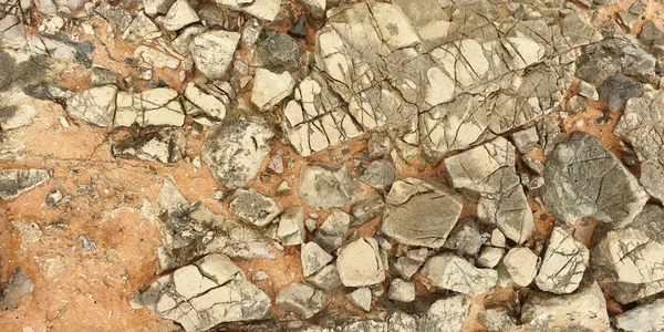 Πέτρα. Υφή της πολύχρωμου μεσογειακής πέτρας στην ακτή — Φωτογραφία Αρχείου
