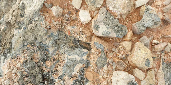 Πέτρα. Υφή της πολύχρωμου μεσογειακής πέτρας στην ακτή — Φωτογραφία Αρχείου