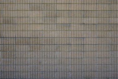 Kaplamalı beton duvar yüzeyi, bina arka planı, yatay görünüm