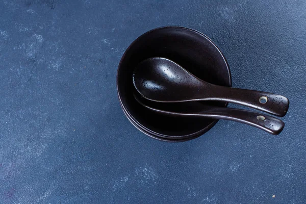 Japanese bamboo food dish equipment on blue stone table