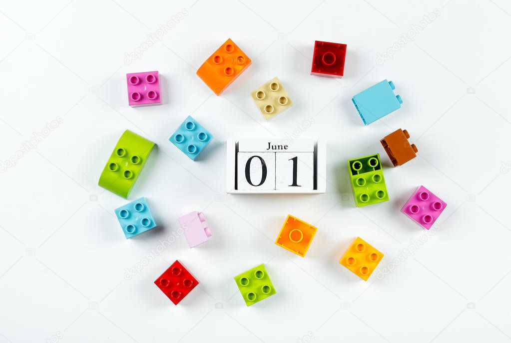 Happy Children's Day. Wooden cubes calendar date June 1st and co