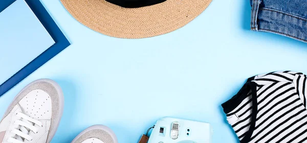 Blue Jeans Shorts Sneakers Striped Shirt Hat Notebook Camera Blue — Stock Photo, Image