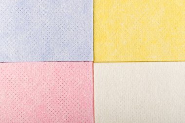 Pastel renk kumaş veya doku ile geometrik arka plan. Yeni yumuşak renk kumaş üstten görünüm. Emici mikrofiber havlu ile metin için yer