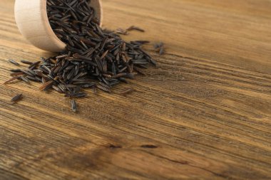 Ham siyah yabani pirinç arka plan üstten görünüm. Sağlıklı diyet Kanada Bio pirinç tahıl doku ile metin için yer