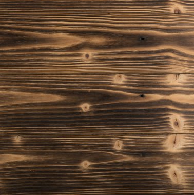 Eski karanlık ahşap arka plan yanmış. Ahşap tahta tahta doku vurulmuş. Vintage yenilikçi tasarım için doğal rustik fotoğraf zemin