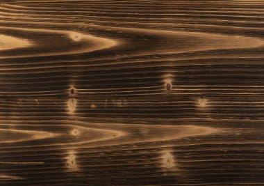 Eski karanlık ahşap arka plan yanmış. Ahşap tahta tahta doku vurulmuş. Vintage yenilikçi tasarım için doğal rustik fotoğraf zemin