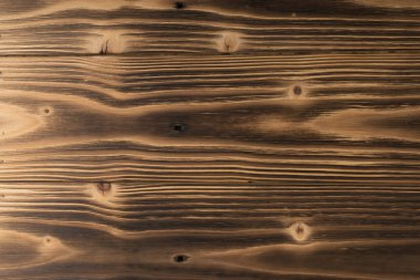 Eski karanlık ahşap arka plan yanmış. Ahşap tahta tahta doku vurulmuş. Vintage yenilikçi tasarım için doğal rustik fotoğraf zemin