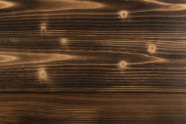 Eski karanlık ahşap arka plan yanmış. Ahşap tahta tahta doku vurulmuş. Vintage yenilikçi tasarım için doğal rustik fotoğraf zemin