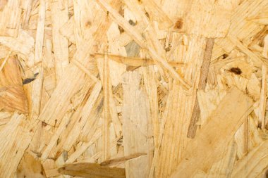 Sunta arka plan üstten görünüm. Hafif kahverengi osb paneli doku veya basılı ve yapıştırılmış talaş zemin