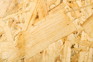 Sunta arka plan üstten görünüm. Hafif kahverengi osb paneli doku veya basılı ve yapıştırılmış talaş zemin