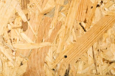 Sunta arka plan üstten görünüm. Hafif kahverengi osb paneli doku veya basılı ve yapıştırılmış talaş zemin