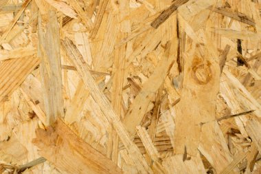 Sunta arka plan üstten görünüm. Hafif kahverengi osb paneli doku veya basılı ve yapıştırılmış talaş zemin