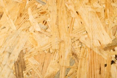 Sunta arka plan üstten görünüm. Hafif kahverengi osb paneli doku veya basılı ve yapıştırılmış talaş zemin