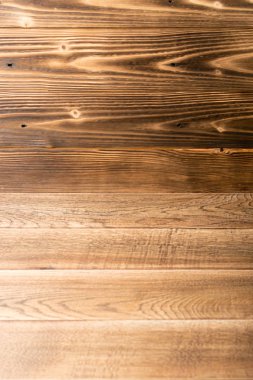 Güzel vintage kahverengi ahşap arka plan. Eski boyalı ahşap masa yüzeyi. Rustik hafif renkli Danışma Kurulu veya tahta doku ile boşaltmak için ürün montaj