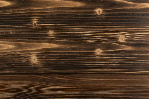 Eski karanlık ahşap arka plan yanmış. Ahşap tahta tahta doku vurulmuş. Vintage yenilikçi tasarım için doğal rustik fotoğraf zemin