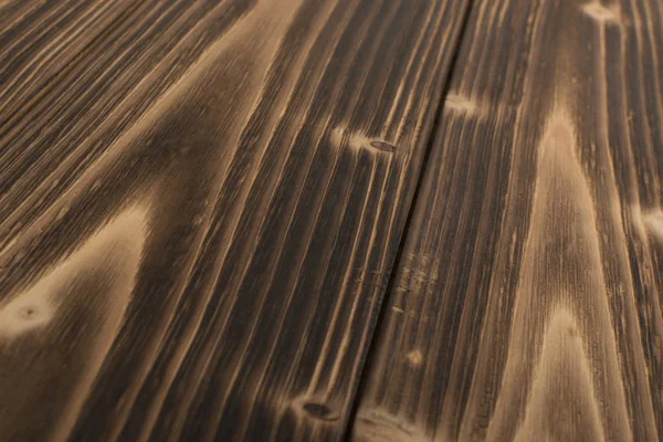 Eski karanlık ahşap arka plan yanmış. Ahşap tahta tahta doku vurulmuş. Vintage yenilikçi tasarım için doğal rustik fotoğraf zemin