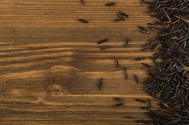 Ham siyah yabani pirinç arka plan üstten görünüm. Sağlıklı diyet Kanada Bio pirinç tahıl doku ile metin için yer