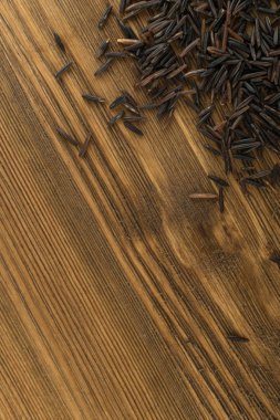 Ham siyah yabani pirinç arka plan üstten görünüm. Sağlıklı diyet Kanada Bio pirinç tahıl doku ile metin için yer