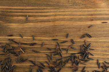 Ham siyah yabani pirinç arka plan üstten görünüm. Sağlıklı diyet Kanada Bio pirinç tahıl doku ile metin için yer