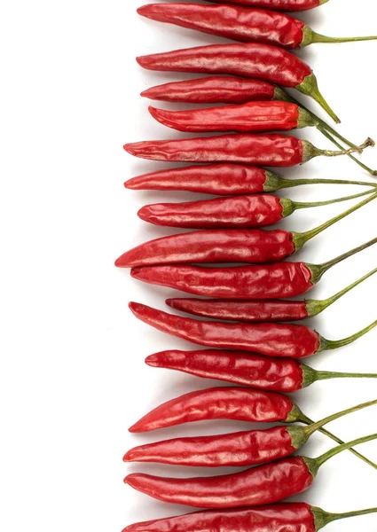 Nagyon Hot Chili Peppers Elszigetelt Fehér Háttér Felülnézet Copyspace Piros — Stock Fotó