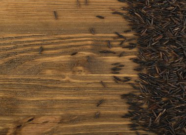 Ham siyah yabani pirinç arka plan üstten görünüm. Sağlıklı diyet Kanada Bio pirinç tahıl doku ile metin için yer