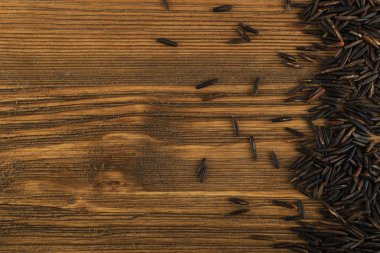 Ham siyah yabani pirinç arka plan üstten görünüm. Sağlıklı diyet Kanada Bio pirinç tahıl doku ile metin için yer