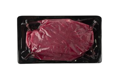 Vacuum black plastic pack with fresh beef steak isolated on white background. Raw meat packed without label top view clipart