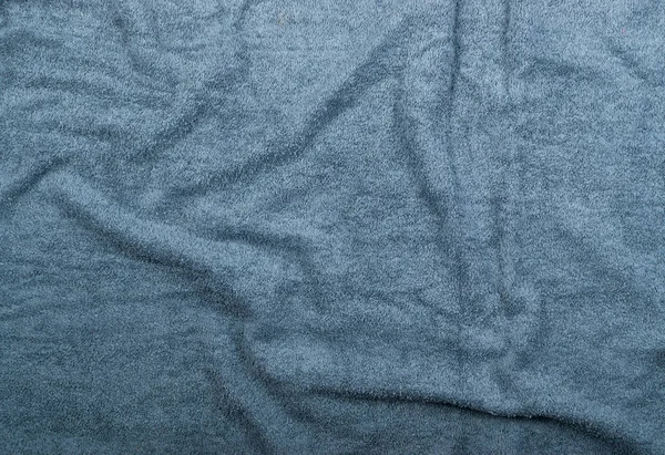 灰色酒店毛巾波纹理或材料关闭 新的毛巾棉毛巾或柔软的毛巾背景与波和褶皱平躺和顶视图 — 图库照片
