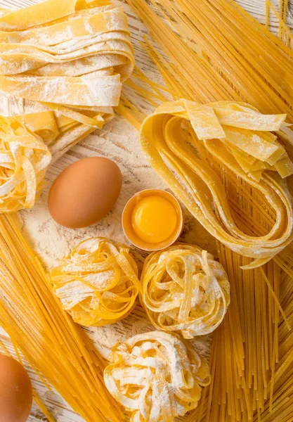 Raw Yellow Italian Pasta Pappardelle Fettuccine Tagliatelle Close Eggs Egg — Stock Photo, Image