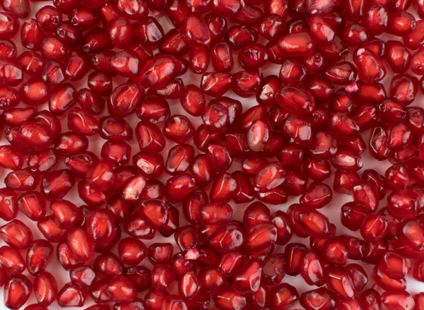 Scattered Pomegranate Seeds Texture on White Background — Stock Photo, Image