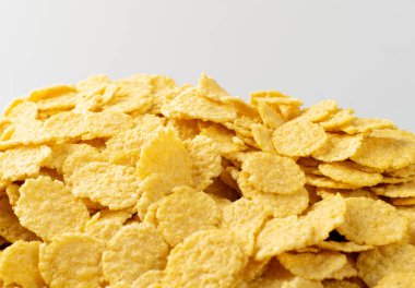 Sarı mısır gevreği dokusu. Altın gevrek mısır gevreği deseni, mısır gevreği duvar kağıdı veya mısır gevreği maketi