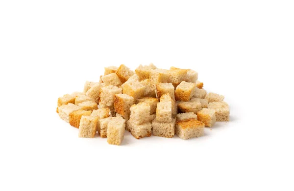 Pile of homemade bread croutons isolated on white background side view. Crispy bread cubes, dry rye crumbs, rusks, crouoton or white roasted crackers cube heap — Stock Image Pile Homemade Bread Croutons Isolated White Background Side View Crispy Stock Image