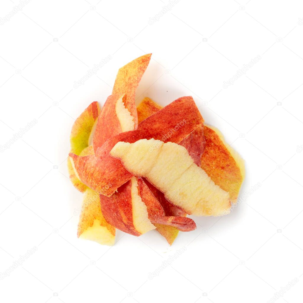 Pile of apple peel isolated on white background. Red apples skin bio garbage for compost top view. Organic waste ingredient