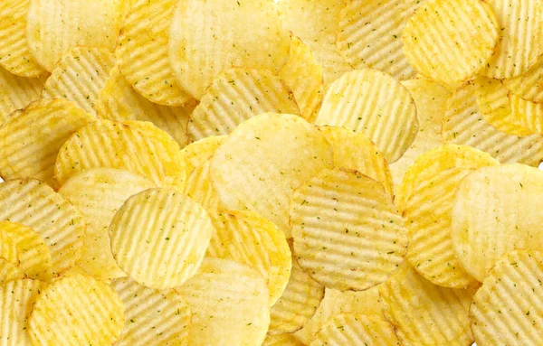 Kabartmalı cips, duvar kağıdı desenli arka plan, dalgalı patates cipsi deseni, çıtır çıtır atıştırmalık şablonu. Çırpılmış cips üst görünümü