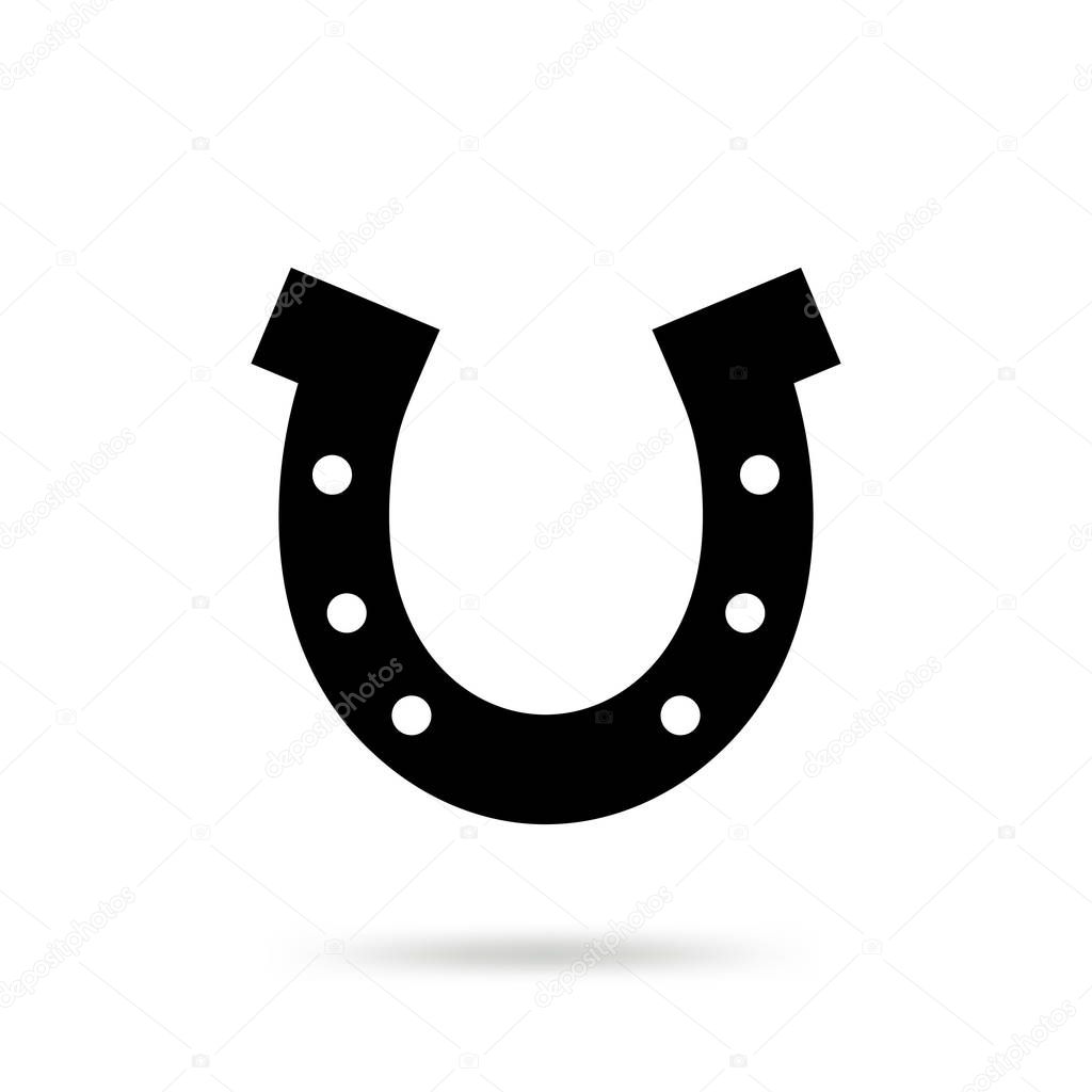 Simple black horseshoe vector icon isolated on white background. Horse shoe silhouette as international good luck symbol. Fortune and success sign